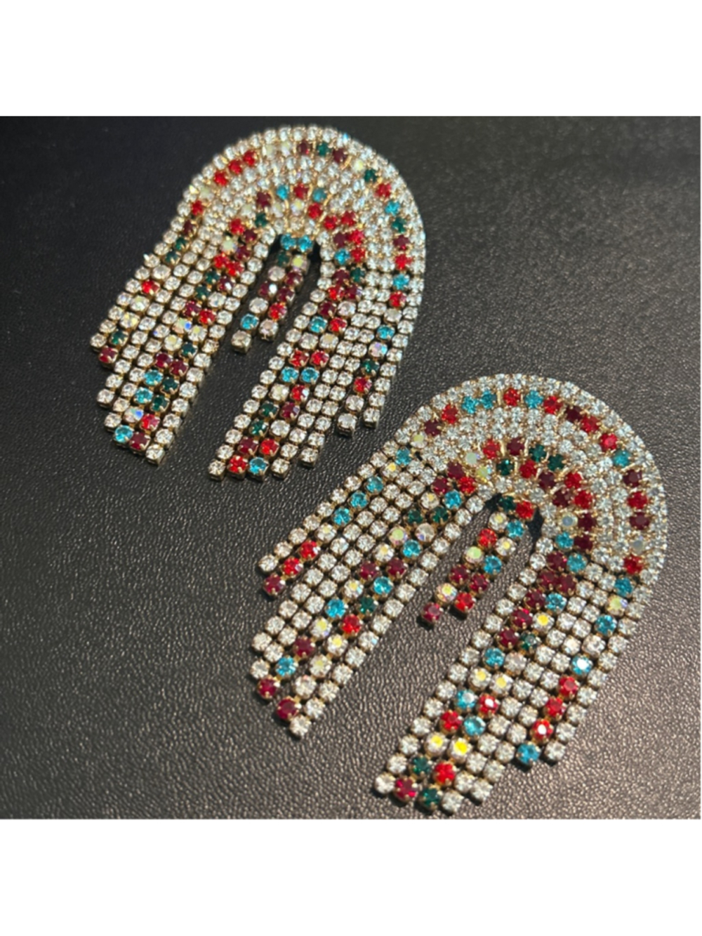 rhinestone curtain earrings featuring colorful fringe crystals.